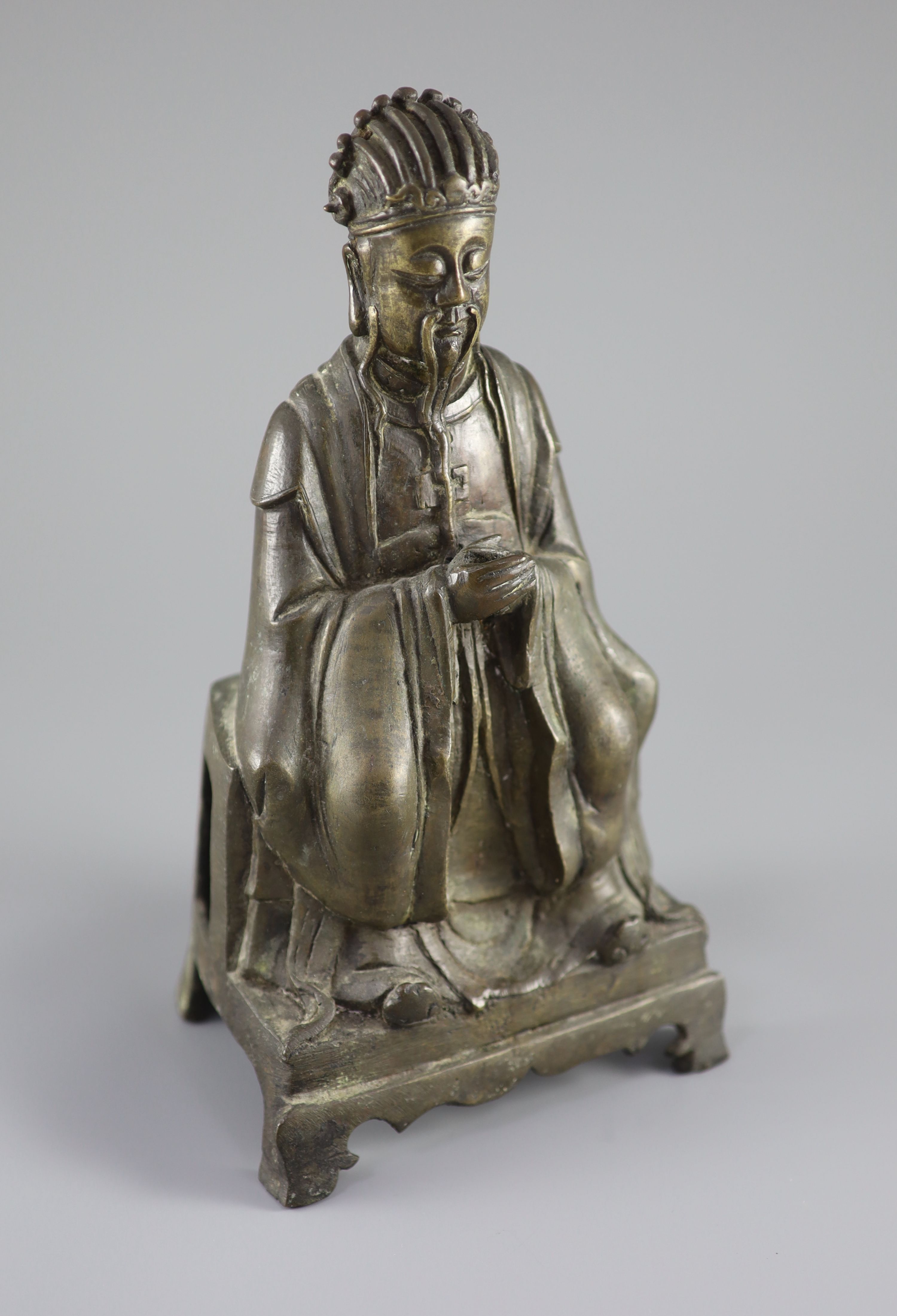 A Chinese bronze seated figure of Wenchang Wang, late Ming dynasty, 17th century, 27 cm high